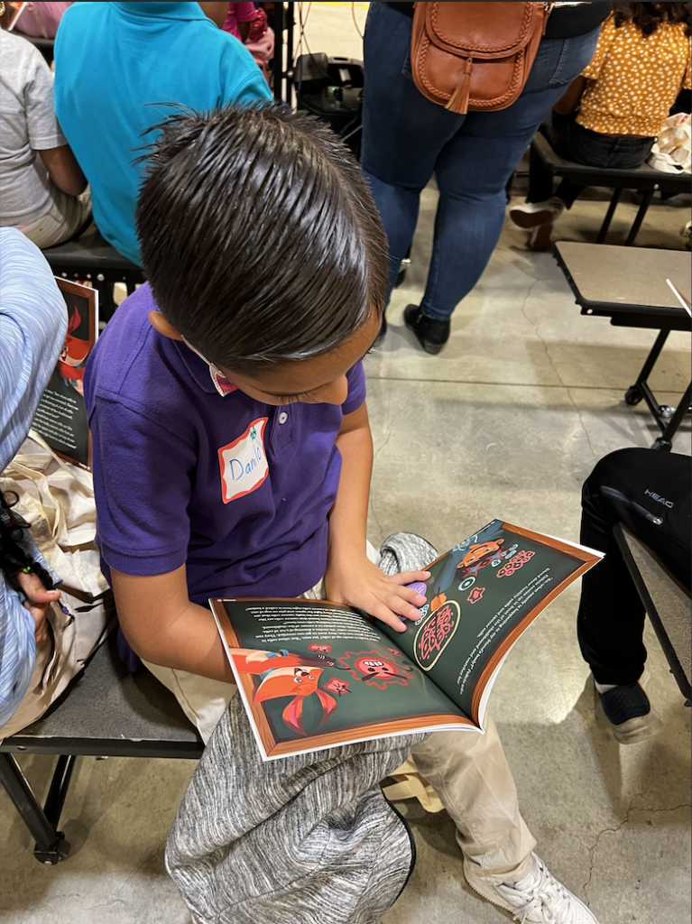 Figure 9: Students reading the oncology book. Photo by Dieuwertje Kast